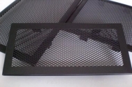 Fireplace ventilation grille opaque black colour with a narrow frame