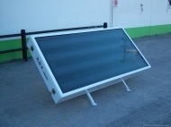 Solar collectors with a built-in reservoir